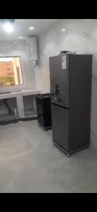 Η κουζίνα ή μικρή κουζίνα στο Port View Luxury Apartment Escacle Ziguinchor