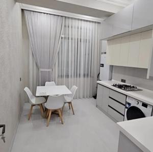 Kuchyň nebo kuchyňský kout v ubytování Ayta Prince Apartment