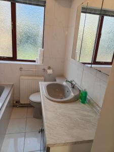 Et badeværelse på Wilmslow House + 7 billeder