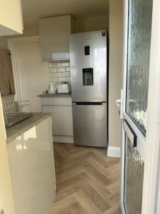 Køkken eller tekøkken på Haven near the sea