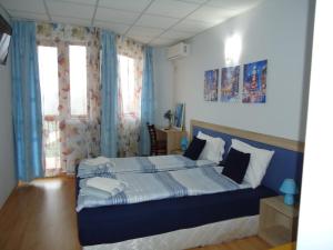 En eller flere senge i et værelse på Къща за гости Пиперите + 53 billeder