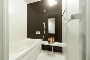 Koupelna v ubytování Goen Little hatchi 子供が喜ぶ隠れ家宿