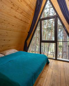 Ένα ή περισσότερα κρεβάτια σε δωμάτιο στο Park Hotel Chalet