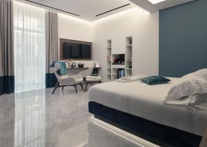 Giường trong phòng chung tại ViaRomaHome - Salerno