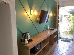 Η κουζίνα ή μικρή κουζίνα στο Hôtel Monet +32 φωτογραφίες