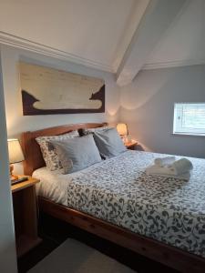 En eller flere senge i et værelse på Guesthouse Veríssimo + 7 billeder