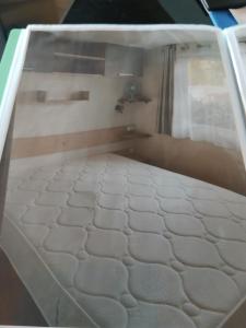 Ένα ή περισσότερα κρεβάτια σε δωμάτιο στο mobil home