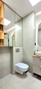 Ένα μπάνιο στο Apartamenty Kościuszki Winda Klimatyzacja
