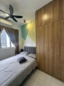 En eller flere senge i et værelse på Selesa DAAD Homestay