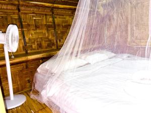 Ένα ή περισσότερα κρεβάτια σε δωμάτιο στο Patong Canal House 2