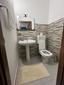 Et badeværelse på D'Aversa Rooms