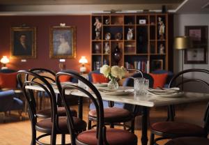 Posezení v ubytování The Excelsior - Small Luxury Hotels of the World