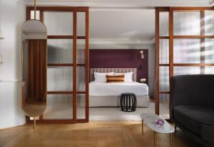 Postel nebo postele na pokoji v ubytování The Excelsior - Small Luxury Hotels of the World