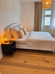 Postel nebo postele na pokoji v ubytování Cozy Apartment Klutert