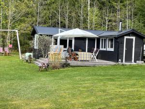 Κήπος έξω από το Thilens cottage by lake Bunn