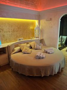 Ένα ή περισσότερα κρεβάτια σε δωμάτιο στο Crisalide Spa