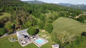 an aerial view of an estate with a swimming pool at La FRAMBOISINE in Les Granges