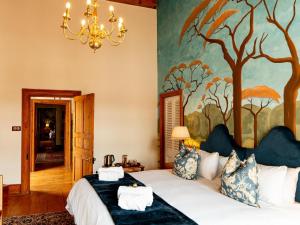 Ένα ή περισσότερα κρεβάτια σε δωμάτιο στο Far Far Away Guesthouse