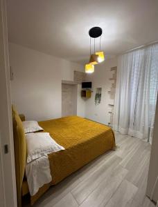 Ένα ή περισσότερα κρεβάτια σε δωμάτιο στο B&B Iris