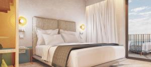 Ένα ή περισσότερα κρεβάτια σε δωμάτιο στο Hotel Ben Marsalforn Affiliated by Meliá +6 φωτογραφίες