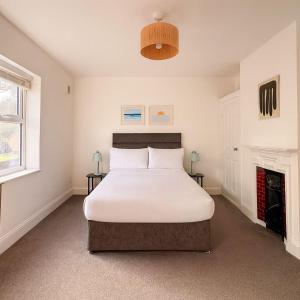 Postel nebo postele na pokoji v ubytování Church Road