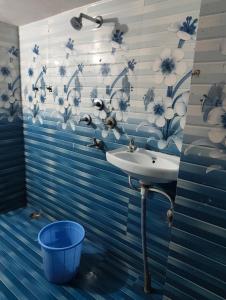 Ένα μπάνιο στο Sai Guest House