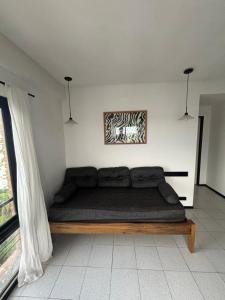 Bett in einem Zimmer mit in der Unterkunft Departamento en el centro de Rafaela in Rafaela