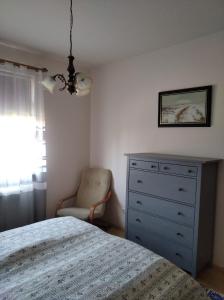 Ένα ή περισσότερα κρεβάτια σε δωμάτιο στο Levendula Vendégház Pannonhalma