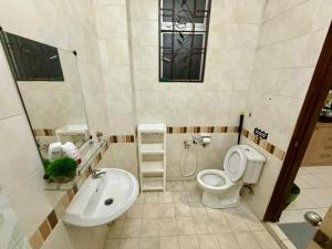 Ένα μπάνιο στο The Nest2 Cozy Home Seksyen 7 Shah Alam