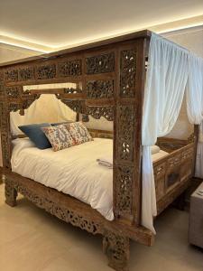 En eller flere senge i et værelse på Finca Fuente Magan