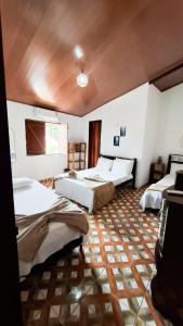 Postel nebo postele na pokoji v ubytování Hospedaria Diamante Lençóis