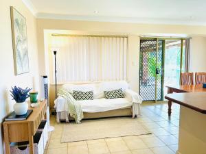 a bedroom with a bed with pillows on it at Pet friendly home near Adventure World Fiona Murdoch in Perth +35 photos