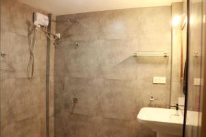 Koupelna v ubytování Blooming Garden