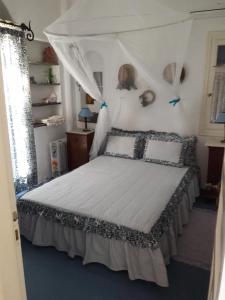 Katil atau katil-katil dalam bilik di Exclusive Beach House