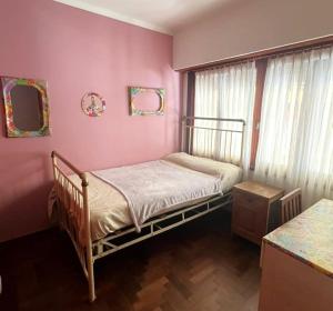 Ένα ή περισσότερα κρεβάτια σε δωμάτιο στο Alquiler Chalet Familiar Temporada Verano +5 φωτογραφίες