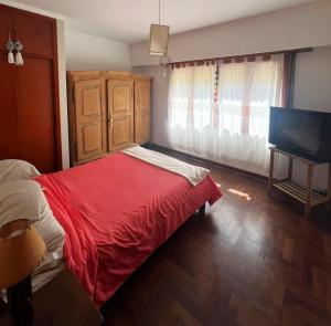 Ένα ή περισσότερα κρεβάτια σε δωμάτιο στο Alquiler Chalet Familiar Temporada Verano