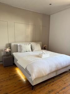 Ένα ή περισσότερα κρεβάτια σε δωμάτιο στο Mooie vakantiewoning in Brugge