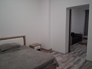 En eller flere senge i et værelse på Zen house