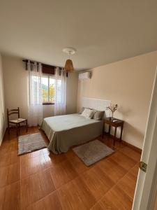 Ένα ή περισσότερα κρεβάτια σε δωμάτιο στο Casa Rustica A Gorgoriña