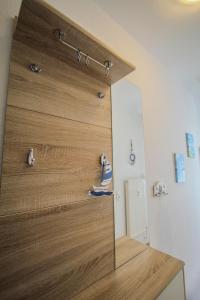 a close up of a wooden door in a room at Vier Jahreszeiten 2-52 in Großenbrode