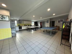 Η αίθουσα παιχνιδιών του Gîte 11 couchages Idéal pro BTP Tancarville