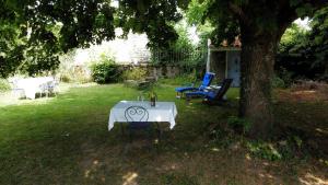 Κήπος έξω από το Les Chambres de la Closerie