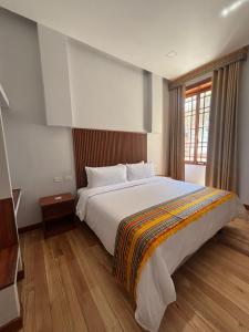 Ένα ή περισσότερα κρεβάτια σε δωμάτιο στο Circasiana Palace Hotel Boutique