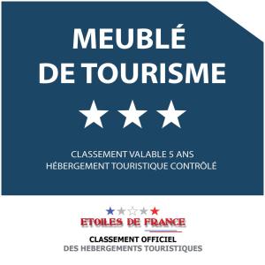 a blue sign with white stars and the text module de tourism at Three-star house 250m from Saint-Suliac's beach in Saint-Suliac