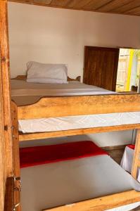 Ένα ή περισσότερα κρεβάτια σε δωμάτιο στο La Cimarrona Cabañas