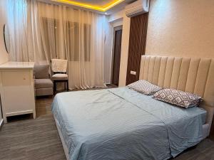 Ένα ή περισσότερα κρεβάτια σε δωμάτιο στο Moderne spacieux cosy