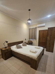 Ένα ή περισσότερα κρεβάτια σε δωμάτιο στο Salty Sun Gozo