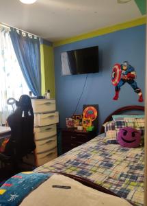 Un televizor și/sau centru de divertisment la De los Olivos