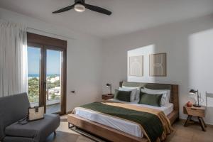 Ένα ή περισσότερα κρεβάτια σε δωμάτιο στο Villa Ete Premier Luxury Villa by Prime Stay +22 φωτογραφίες