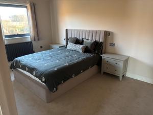 Postel nebo postele na pokoji v ubytování Four Seasons Lodge